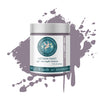 A can of purple gray chalk paint and clay paint with a brush showing the paint's consistency.